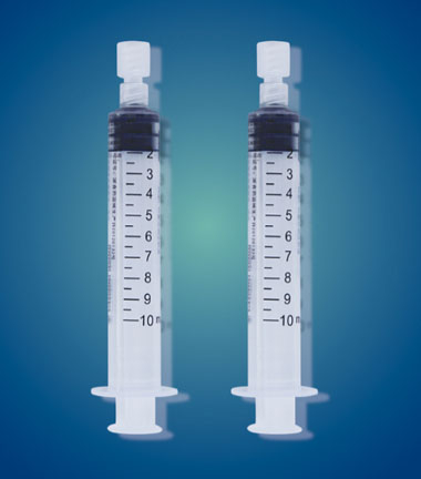 Pre-filled flush syringes