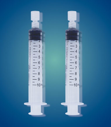 Pre-filled flush syringes